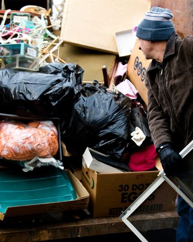 Man stacking rubbish